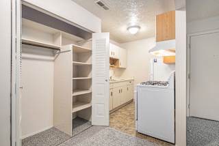 Kitchen with Large Closet at Granada Apartments, Jackson, 49202