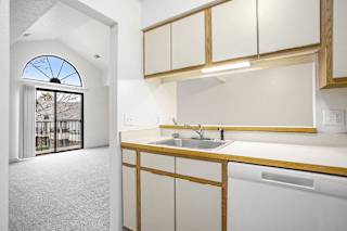 a kitchen with a dishwasher at Hampton Lakes Apartments, Michigan, 49534
