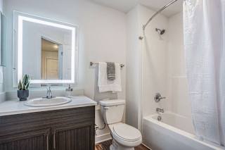 a bathroom with a sink toilet and a shower at Meadowbrooke Apartment Homes, Grand Rapids, 49512