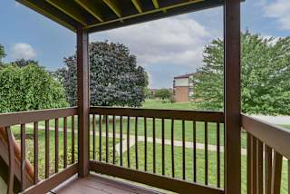 a view of the yard from the deck of a home at Old Monterey Apartments, Springfield