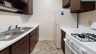 Kitchen at Newport Village Apartments, Portage, MI