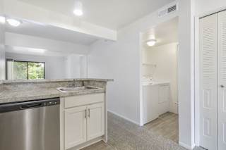 view of laundry room with a washer and dryer from the kitchen at North Pointe Apartments, Indiana, 46514