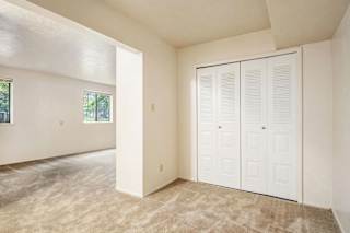 A sleeping area with a large closet at Normandy Village Apartments, Michigan City, 46360
