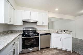 A kitchen with stainless steel appliances at North Pointe Apartments, Elkhart, IN, 46514
