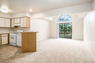 Entry to dining, living and kitchen areas at Pine Knoll Apartments, Battle Creek, 49014