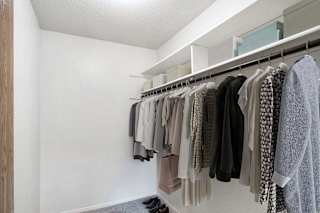 a large closet at Seville Apartments, Kalamazoo, MI, 49009