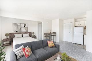spacious studio living and kitchen areas at Seville Apartments in Kalamazoo, MI 49009