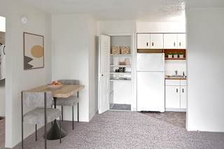 kitchen with a closet at Seville Apartments, Kalamazoo, 49009