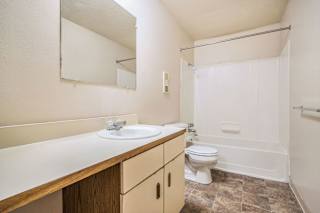 bathroom with counter space at Seville Apartments, Kalamazoo, MI