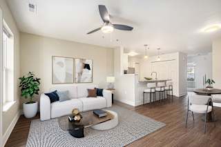 living room with ceiling fan at Signature Pointe Apartment Homes in Athens, AL
