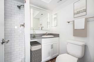 Second bathroom with a walk in shower at The Crossings Apartments, Michigan, 49508