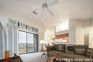 Tyler Living Room at Prairie Lakes Apartments, Peoria, IL, 61615