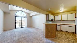 Open floor plan featuring large living and dining rooms and a kitchen at Windmill Lakes Apartments, Holland, Michigan 49424