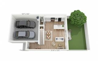 A dollhouse with a green tree outside and a car in the driveway.