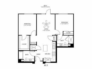 A floor plan of a home with two bedrooms, a living room, a kitchen, a bathroom, and a dry bar.