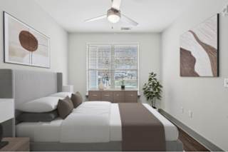 A top-down view of a modern apartment layout with a living room, kitchen, and bedrooms.