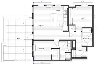 A floor plan of a house with labeled rooms such as kitchen, living area, and bathrooms.