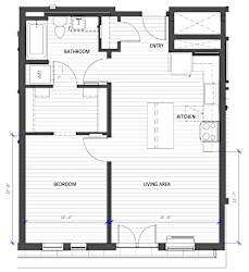 A floor plan of a small apartment with a living area, kitchen, bathroom, and bedroom.