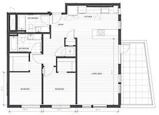A floor plan of a house with two bedrooms, a living area, a kitchen, and two bathrooms.