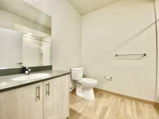 3 bed 2 bath bathroom with ADA accessibility