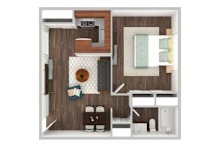 A small room with a bed, a table, and a chair.