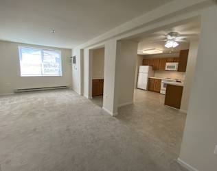 A spacious living room with study room