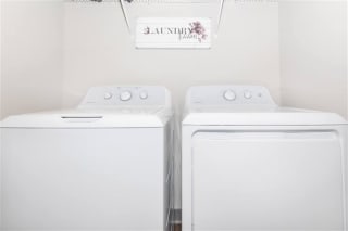 Laundry Room at One White Oak Apartments, Cumming, 30041