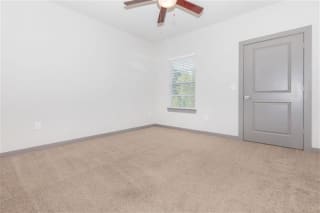 Room with Carpeted Floor at One White Oak Apartments, Cumming