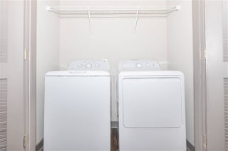 Small Laundry Room at One White Oak Apartments, Cumming, GA, 30041