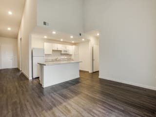 Living and kitchen at Aviator at Brooks Apartments, San Antonio, 78235