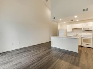 Living with wooden floor plan at Aviator at Brooks, San Antonio, 78235