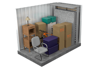 A room with a chair, a desk, a lamp, and boxes.