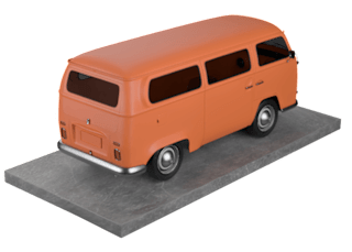 An orange Volkswagen van is parked on a grey surface.