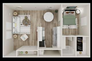 A small, neatly organized kitchen with white cabinets and a wooden backsplash.