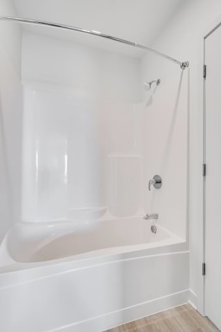 TheRowanLuxuryApartments large Shower and tub combo at The Rowan Apartments in Eagan Minnesota