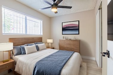 Furnished bedroom shown — representative home at Arcadia 52.