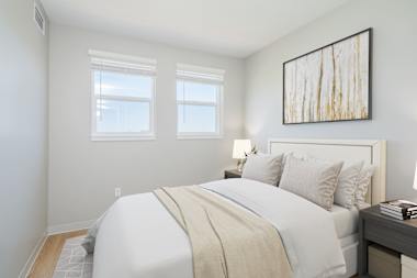 Furnished bedroom shown at Garfield Terrace.