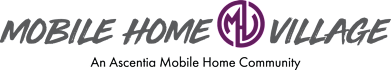 the logo for an ascetic monk home community on a green at Mobile Home Village, Cheyenne, Wyoming