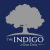 the logo for the indigo at cross creek