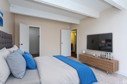 Bedroom With TV at Monaco Lakes, Denver, CO