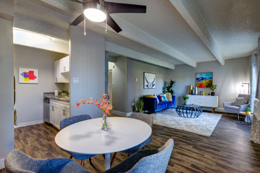 Elegant Dining Area With Living Room View at Monaco Lakes, Colorado, 80222
