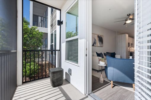 living room door opens to a balcony at Mira at Palmer Ranch, Florida, 34238