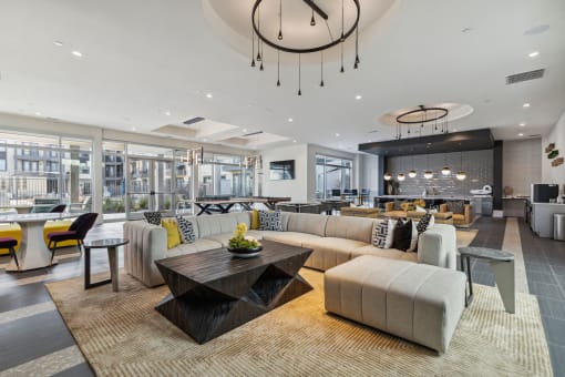 a living room with couches and chairs and a table at LynnCora, Texas