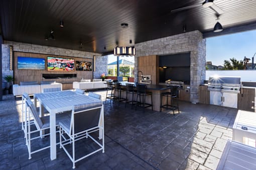 Pool Pavilion at Amara with pizza oven, grill, large televisions and counter seating