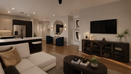 A modern living room with a white sofa and a wooden coffee table.