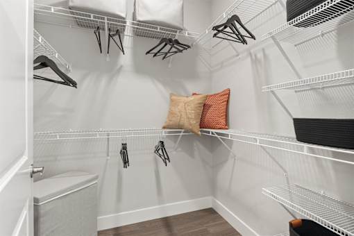 a walk in closet with white walls and shelves at Mira at Palmer Ranch, Sarasota, 34238