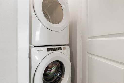 a washer and dryer in a laundry room with the door open at Mira at Palmer Ranch, Sarasota, FL, Florida, 34238