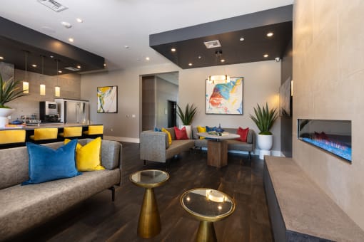 resident lounge area with fireplace at Solasta, Sacramento, CA, 95831