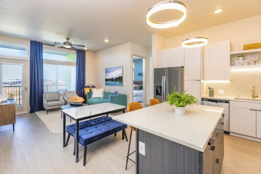 open concept living area with living room and kitchen at Zeta Luxury Apartments in Sacramento, CA