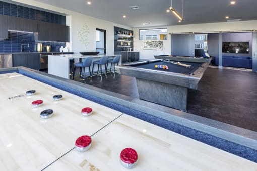 Social Lounge with Billiards, Shuffleboard, and Kitchenette at Zeta Luxury Apartments in Sacramento, CA